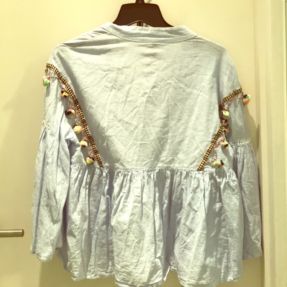 I’m selling a blue blouse
